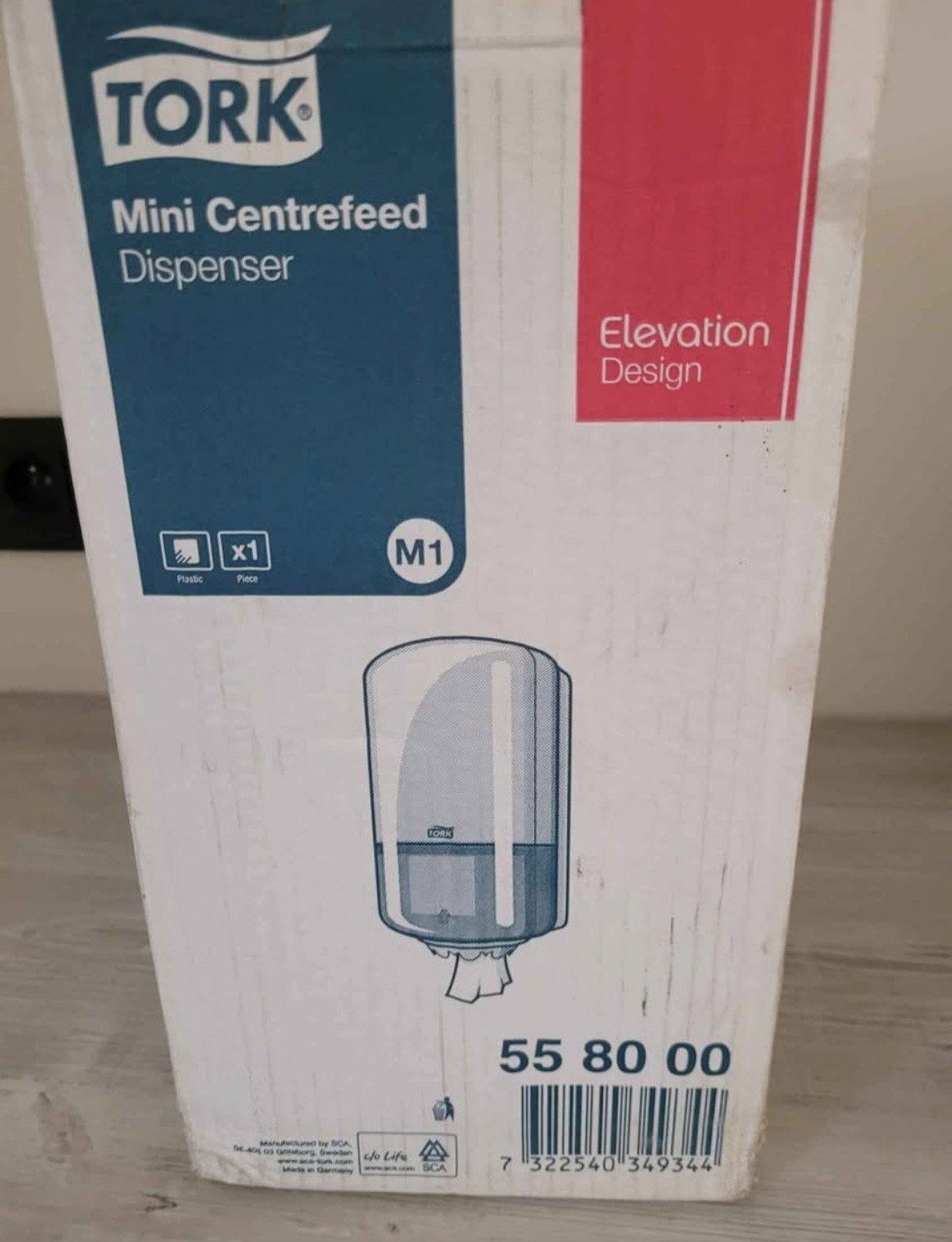 Tork mini centrefeed dispenser m1, Ophalen