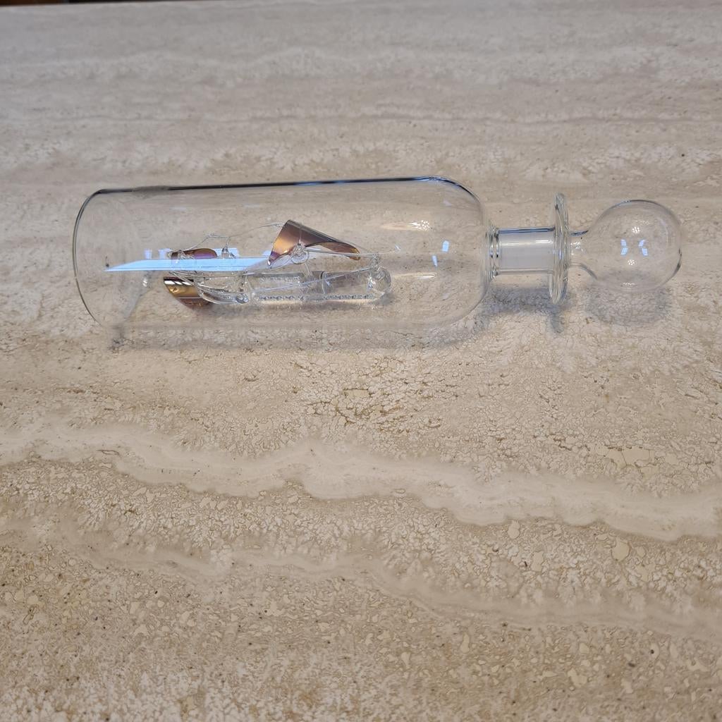 Fles met schip, Ophalen