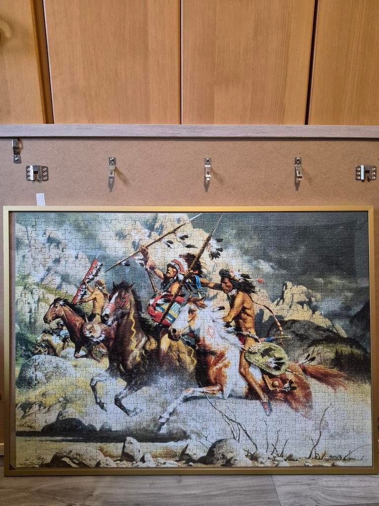 2 gemaakte puzzels ingekaderd Indianen, Enlèvement