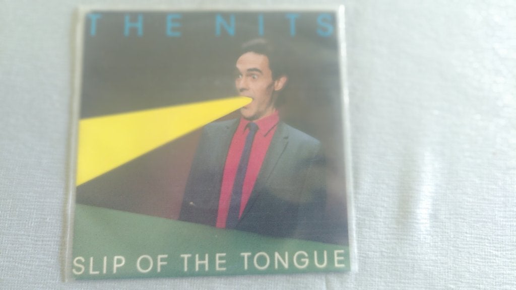 VINYLSINGLE THE NITS--SLIP OF THE TONGUE---, Cd's en Dvd's, Gebruikt, 7 inch, Single, Ophalen of Verzenden