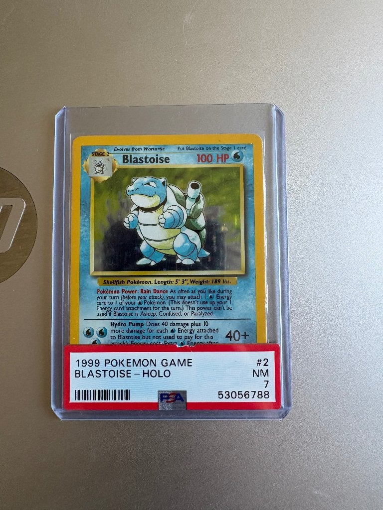 Base set holo blastoise PSA 7, Ophalen of Verzenden, Zo goed als nieuw, Losse kaart