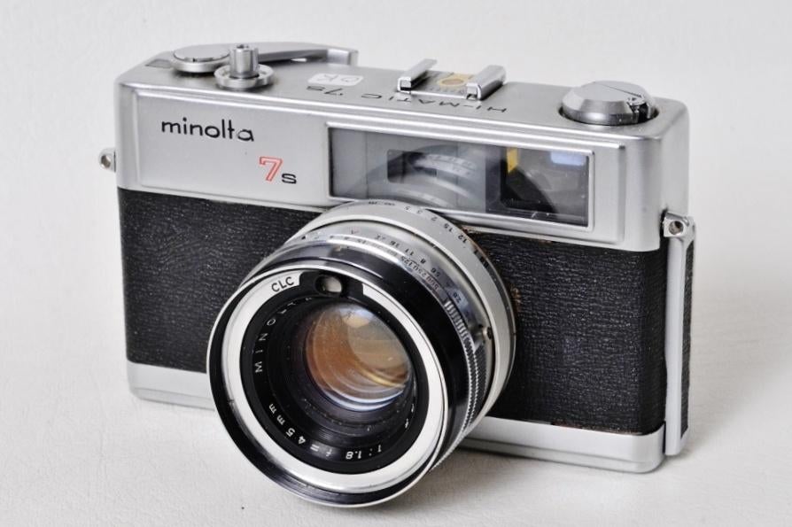 Minolta HI-MATIC 7s 1.8 45 mm lens + hoesje + vakje, Audio, Tv en Foto, Fotocamera's Analoog, Ophalen of Verzenden, Gebruikt, Minolta