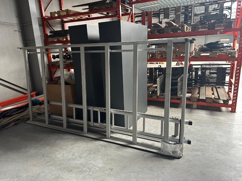 Dakdrager voor bestelwagen met ingebouwde ladder, Ophalen