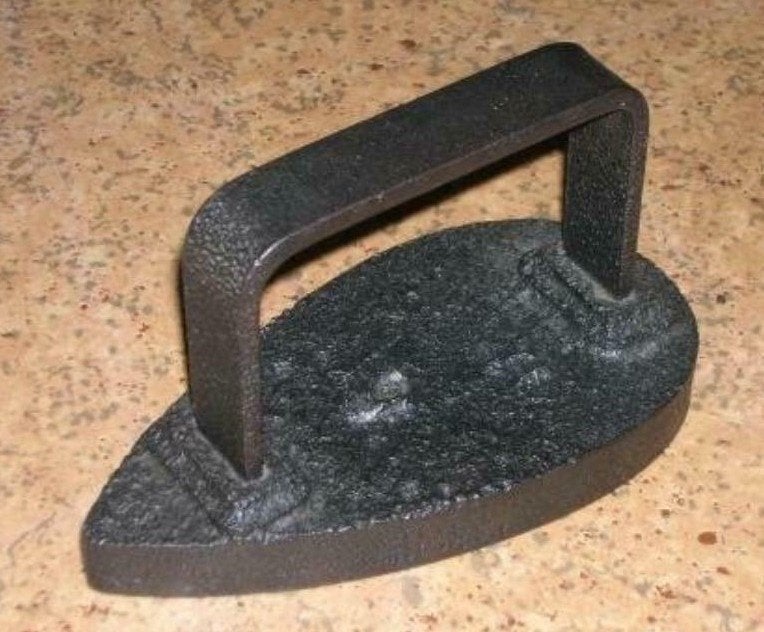 Vintage fonten strijkijzer, Ophalen