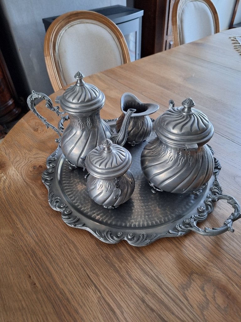 tinnen potjes, Ophalen