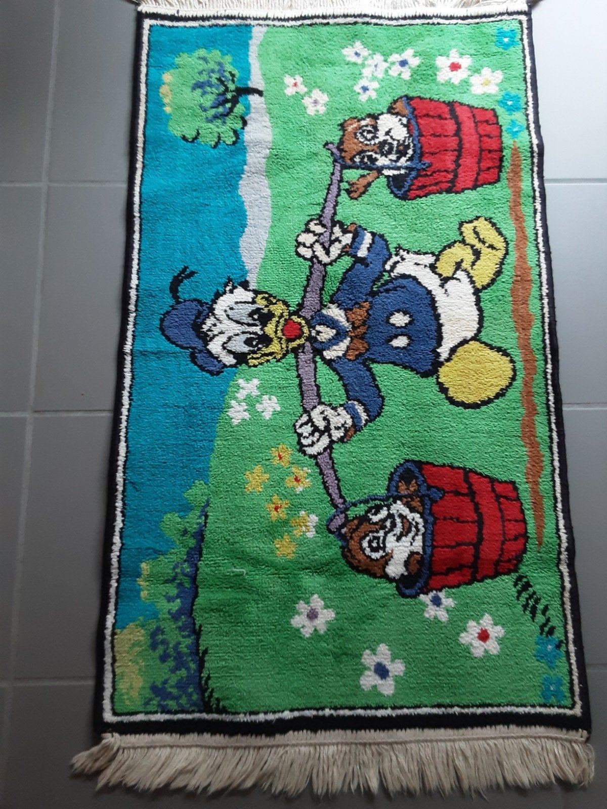 Kinder tapijtjes, Ophalen