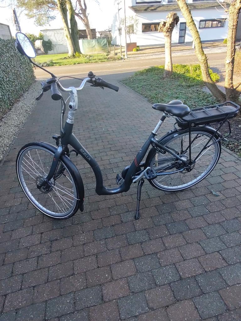 Elektrische fiets lage instap van het merk Stella, Ophalen, Zo goed als nieuw, 50 km per accu of meer