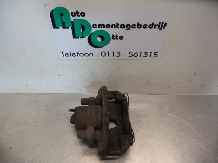 Remklauw (Tang) rechts-voor van een Ford Focus (Focus 04-), Gebruikt, -, -, Ophalen of Verzenden