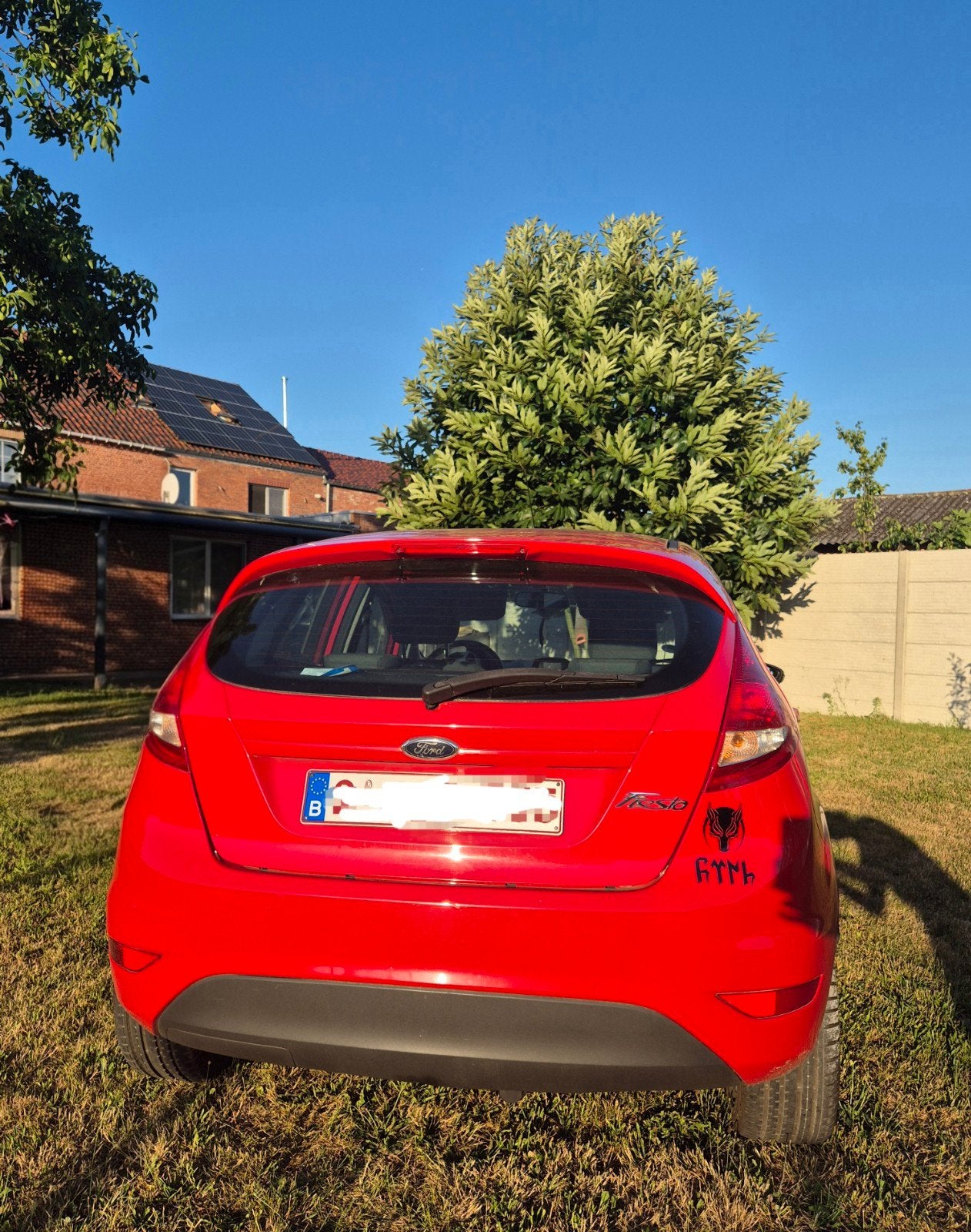 Ford Fiesta 1.25 essence, Rouge, Euro 5, Achat, Noir
