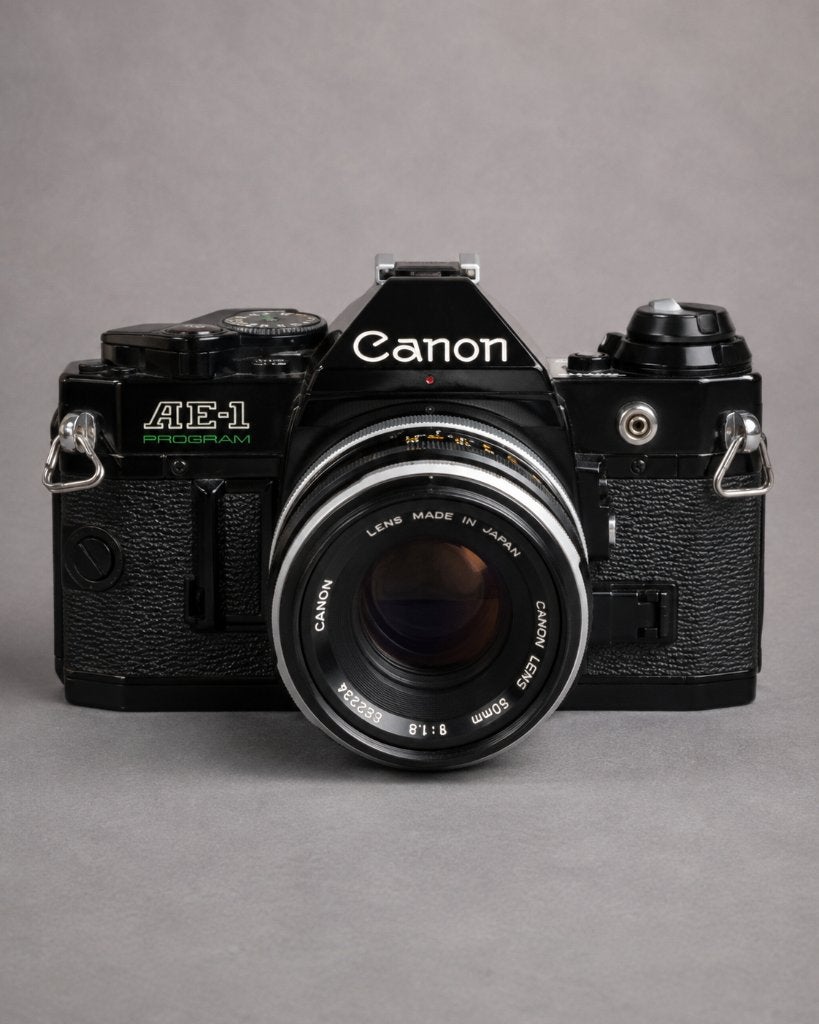 Canon AE-1 program + FL 50mm f/1.8 + Cosina 28-200 mm, Spiegelreflex, Canon, Ophalen of Verzenden, Zo goed als nieuw