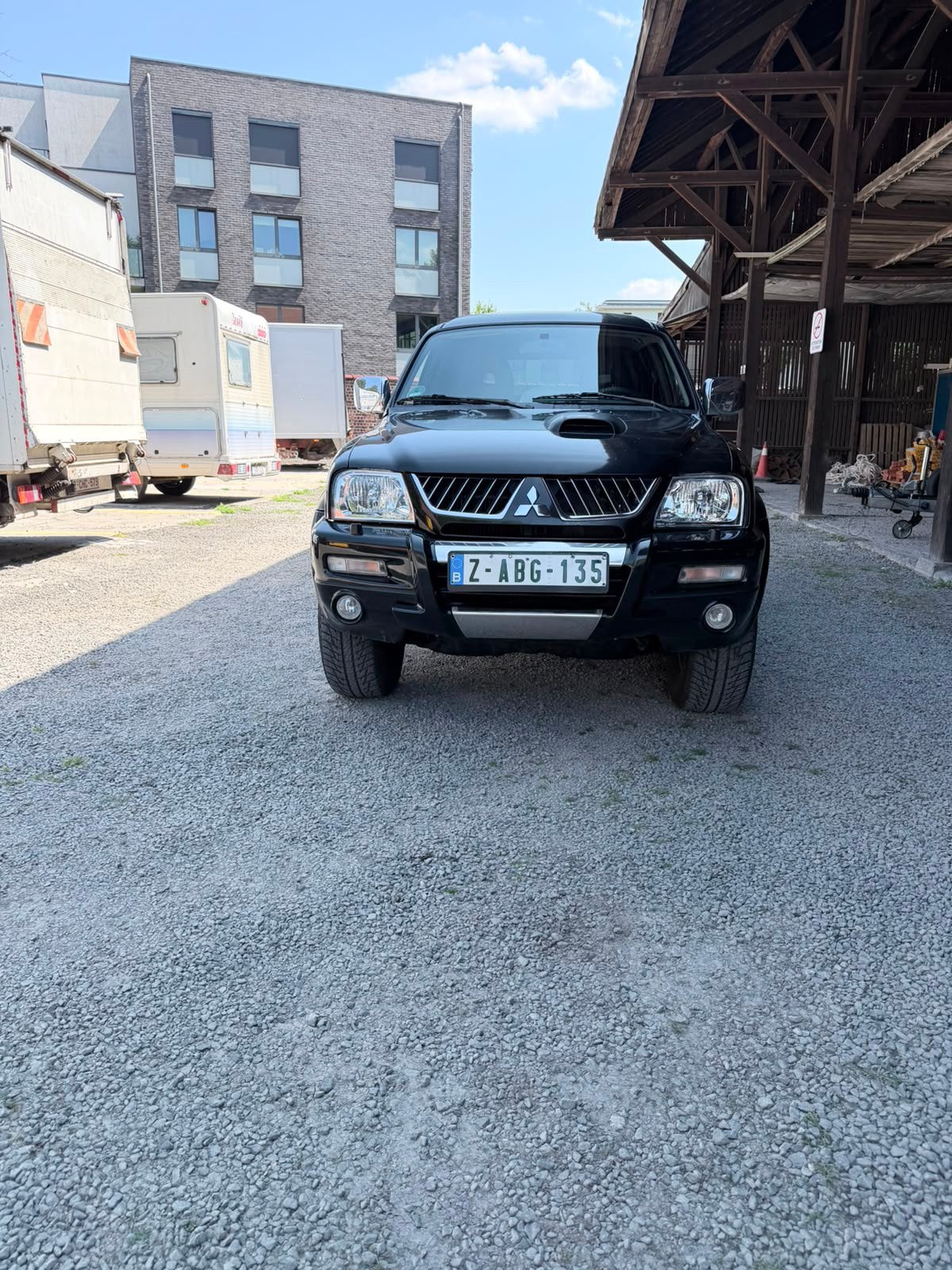Mitsubishi L200*Export* schoon 0485905657, Auto's, Mitsubishi, 2500 cc, 4 deurs, Stof, Zwart