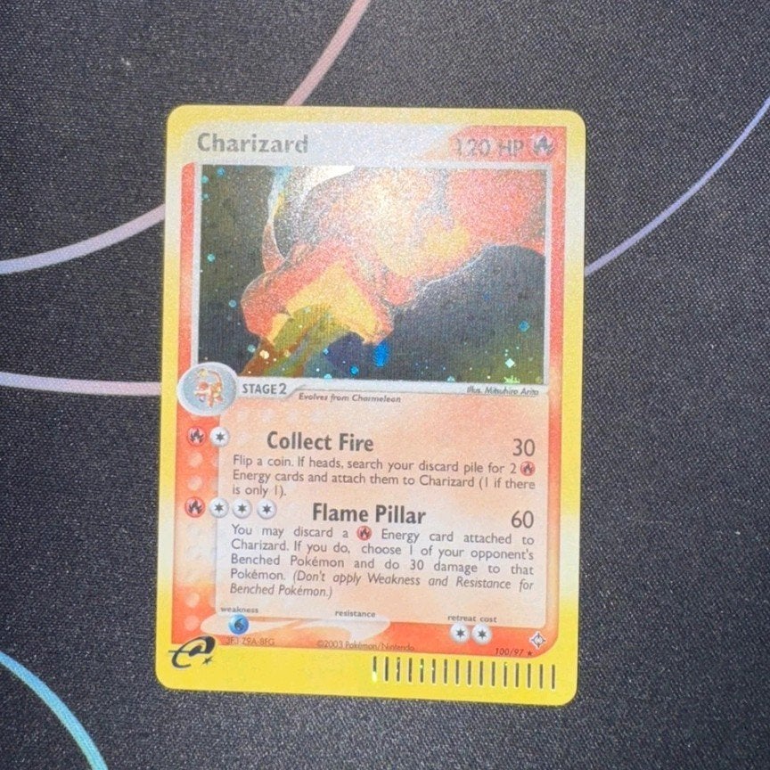 Charizard #100 dragon, Hobby en Vrije tijd, Verzamelkaartspellen | Pokémon, Ophalen of Verzenden, Zo goed als nieuw