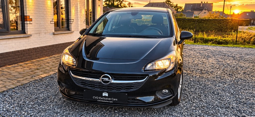 Opel Corsa 1.2i - Bluetooth - Dagrijverlichting - 12MGAR, Auto's, Voorwielaandrijving, Dealer onderhouden, Stof, 4 cilinders