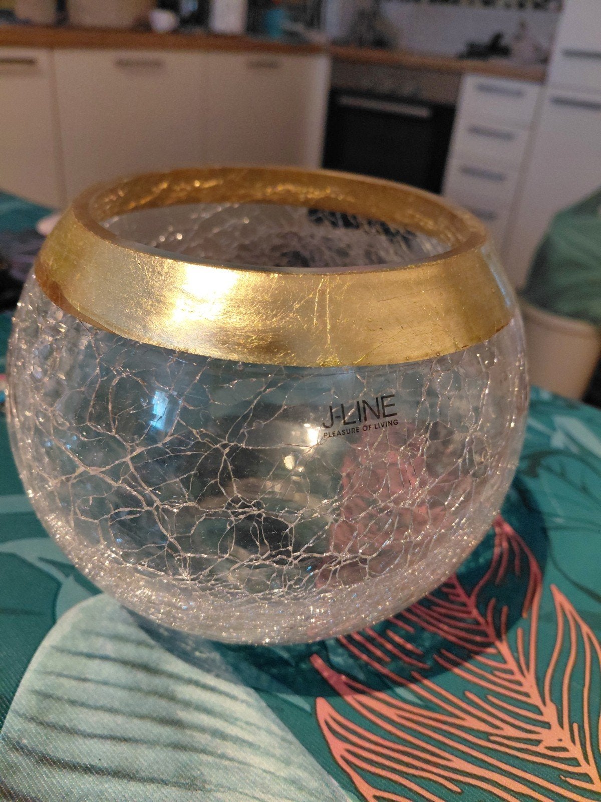 J line kristallen pot, Ophalen