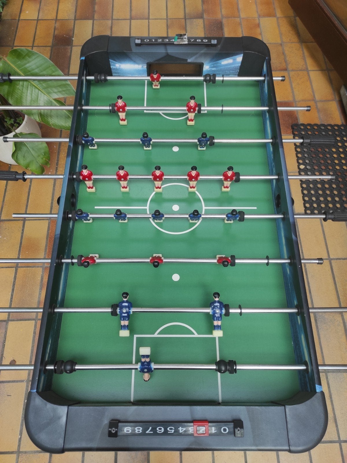Voetbaltafel, Ophalen