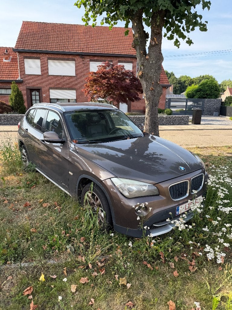 BMW X1 sDrive18d 2011 - Verkoop in huidige staat., Auto's, BMW, Euro 5, 1995 cc, Zwart, Bruin