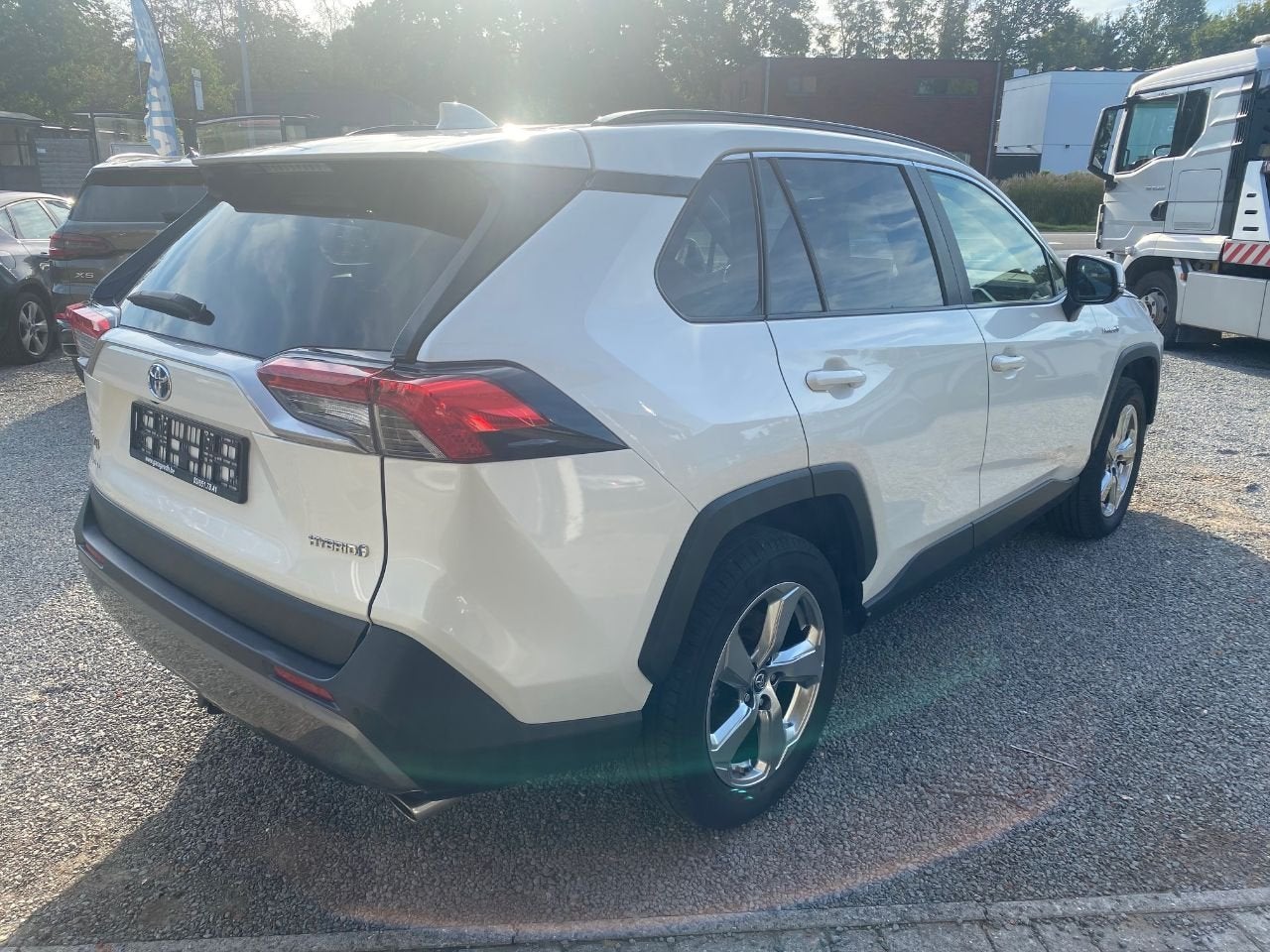 Toyota RAV4 Hybrid 4x4 STYLE (bj 2019, automaat), Auto's, Stof, Gebruikt, Euro 6, 2487 cc