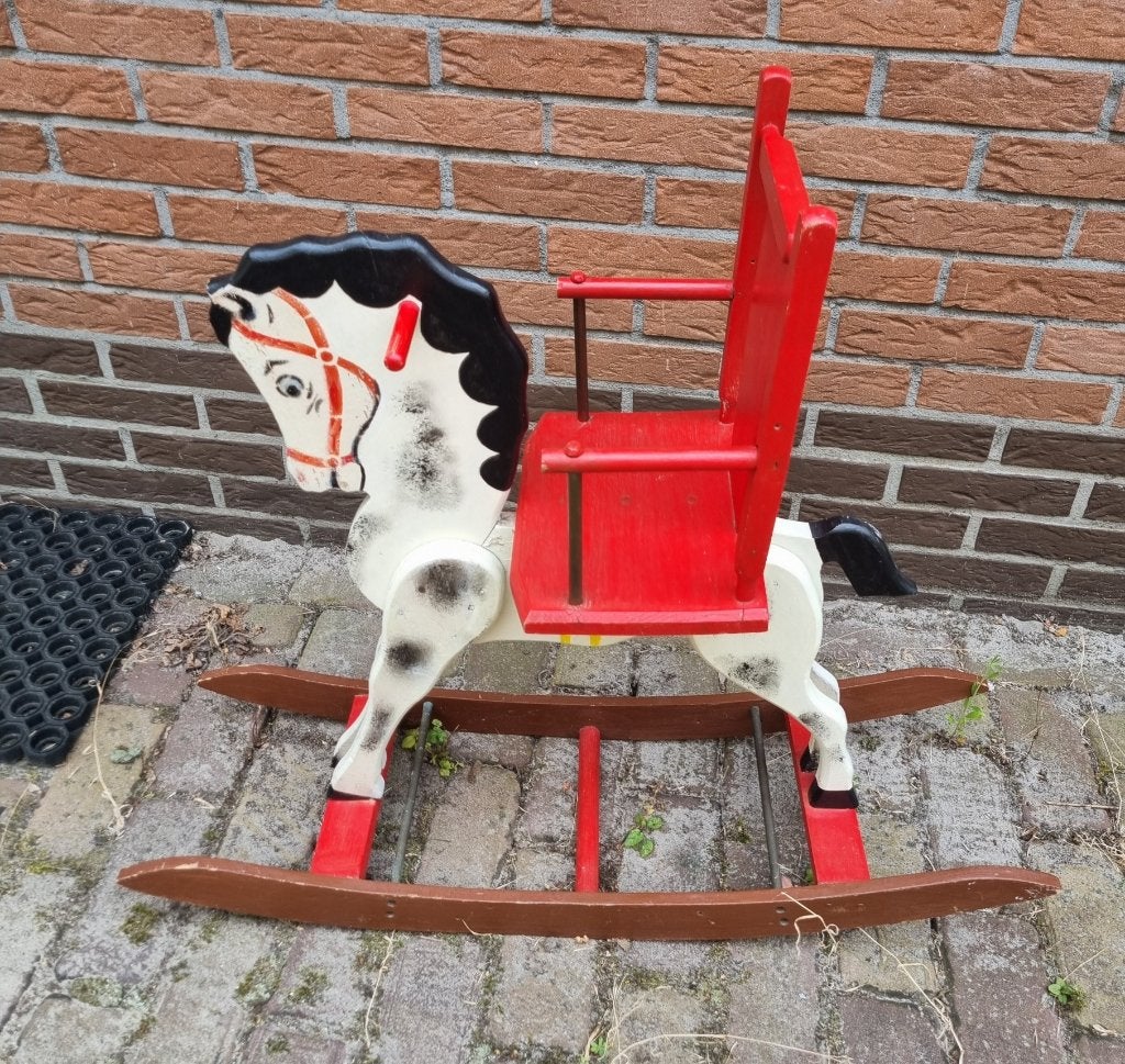 Vintage schommelpaard, Ophalen