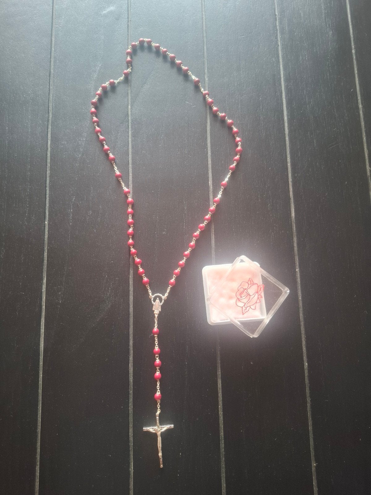 paternoster rood met zilver, Ophalen