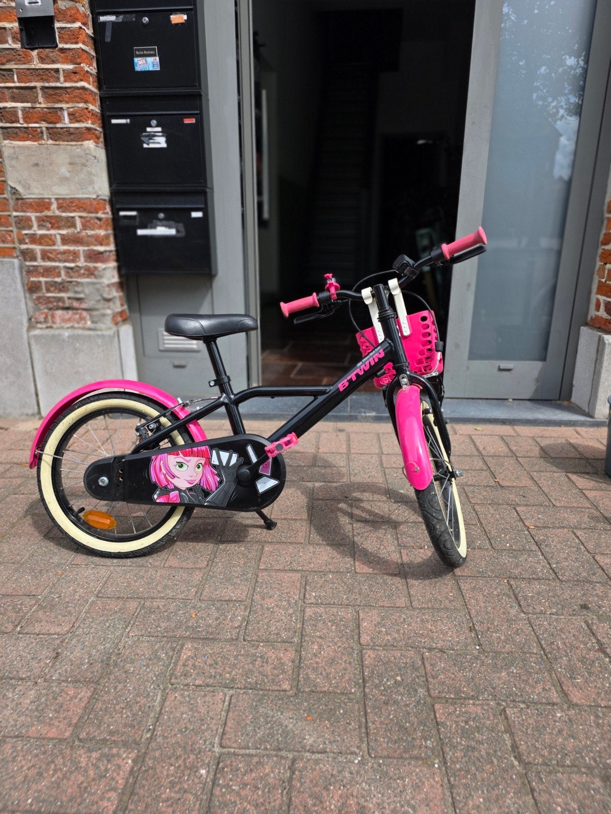 B’Twin Spy Hero Girl 500 kinderfiets 16 inch – roze/zwart, Ophalen, Zijwieltjes