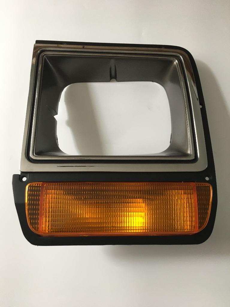 Te koop Koplamp bezel L Dodge w200 d200 ramcharger, Auto-onderdelen, Ophalen of Verzenden, Nieuw, Amerikaanse onderdelen