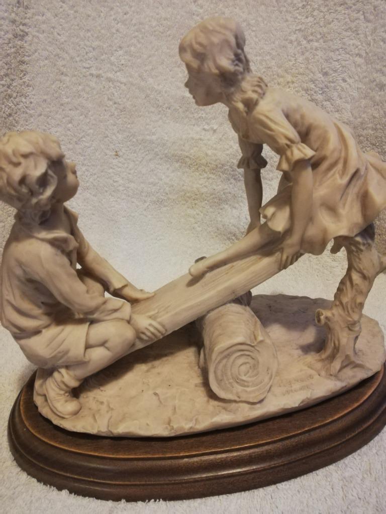 Statue enfant sur balançoire, Enlèvement ou Envoi