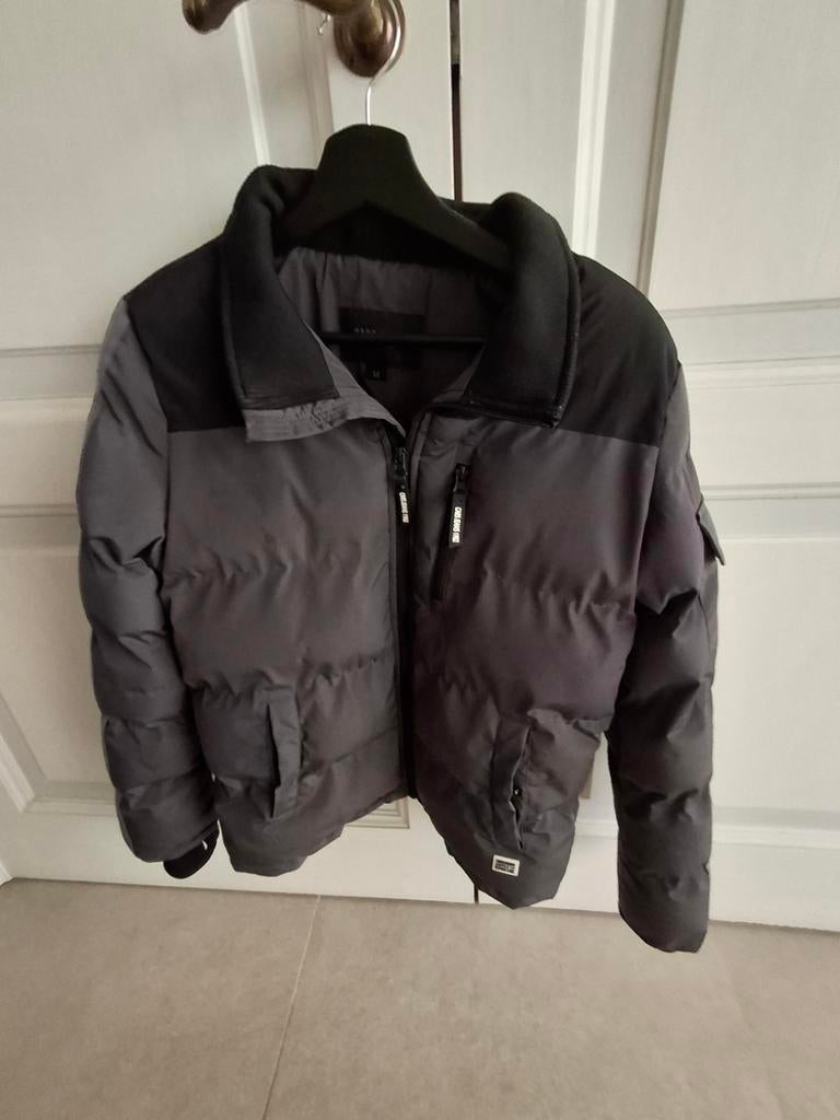 Een jongenswinterjas, Ophalen