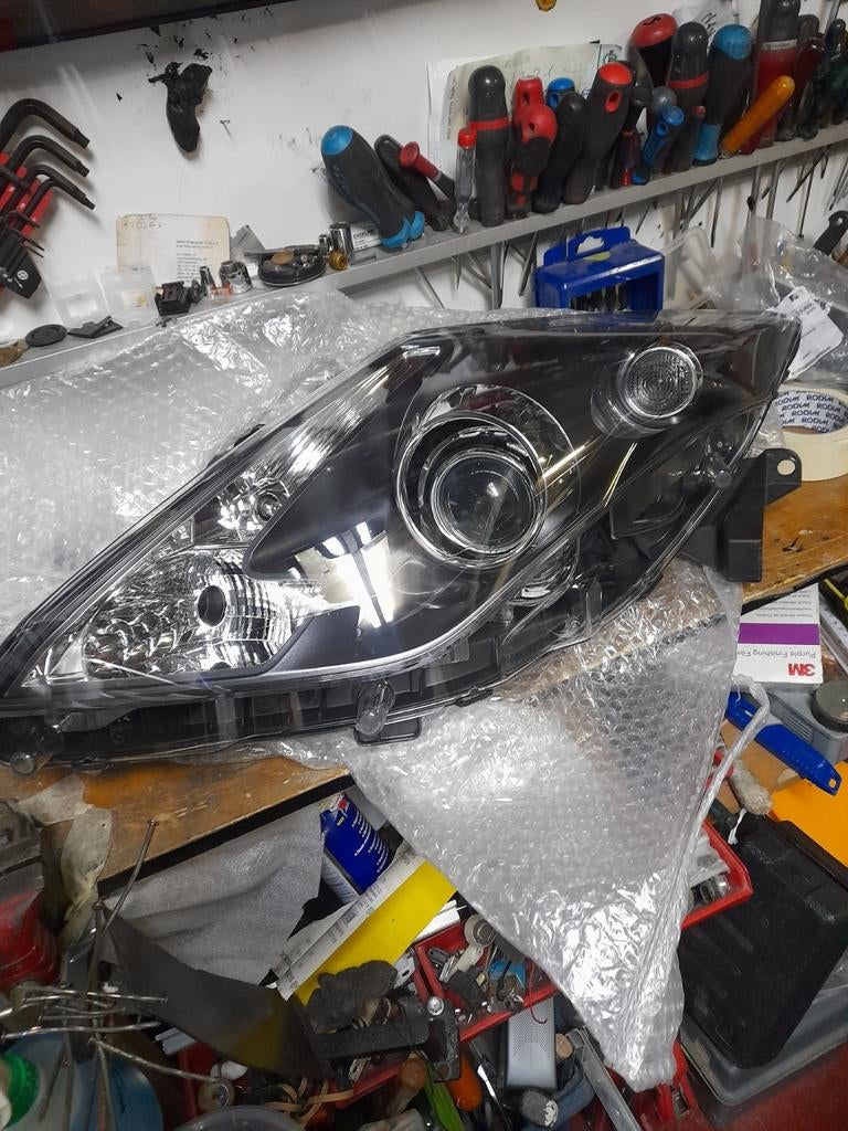 Nouvelles phare xénon Renault laguna côté G, Enlèvement ou Envoi