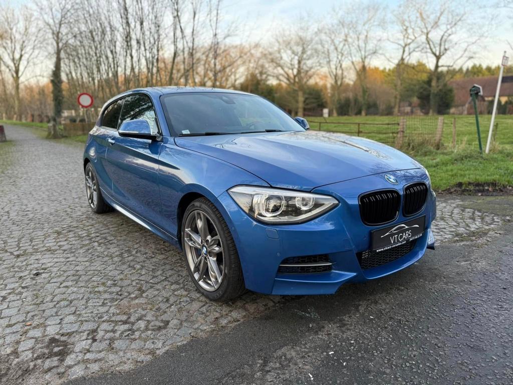 BMW M135I XDRIVE / XENON / OPEN DAK / AUTOMAAT / GARANTIE, Automaat, 1 Reeks, Blauw, Leder