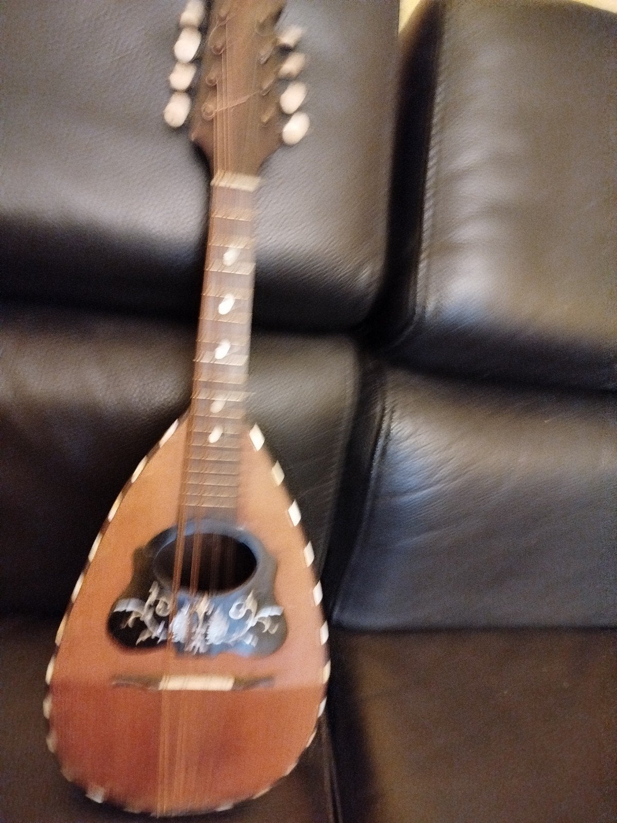 Oude mandoline handgemaakt, Ophalen