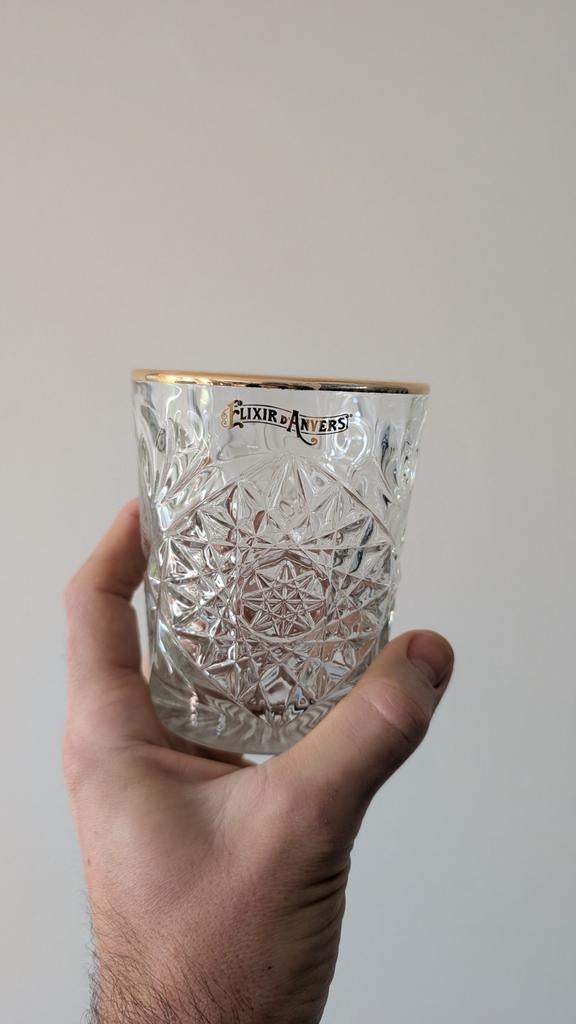 Elixir d Anvers glazen, Enlèvement