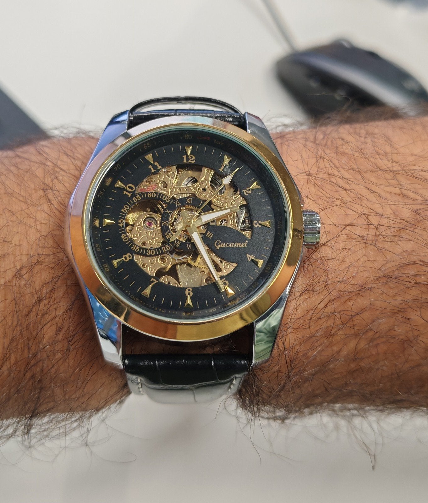 Montre automatique squelette Gucamel – cadran noir et doré, Bijoux, Sacs & Beauté, Envoi, Neuf, Argent