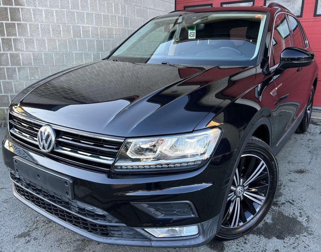 Volkswagen Tiguan 2.0 TDi SCR Comfortline BMT DSG (bj 2017), Auto's, Automaat, Gebruikt, 4 cilinders, Zwart