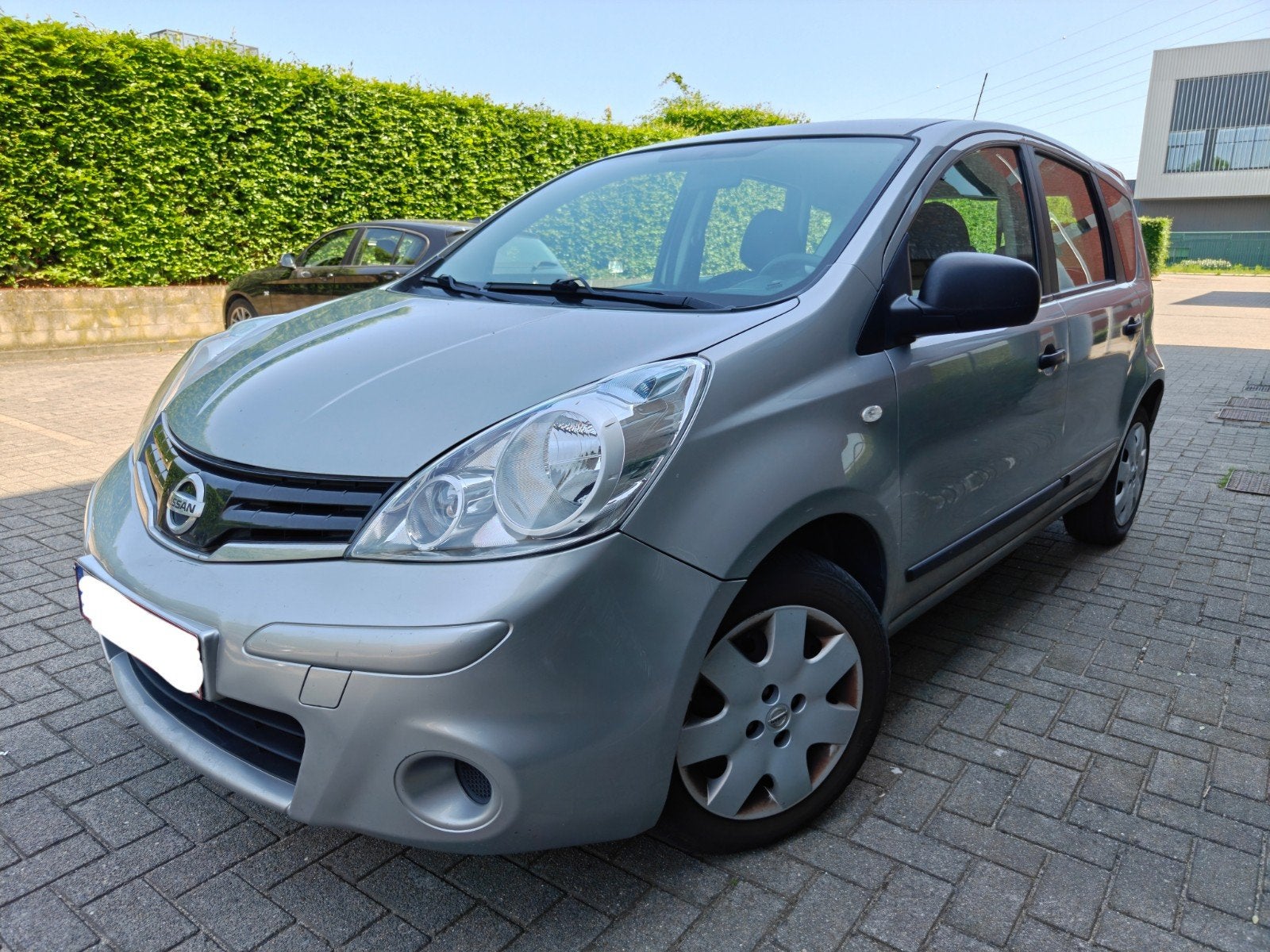 Nissan Note 1.4i/ 122.000 km/2012/ Airco/ 1e eigenaar, Euro 5, Stof, Zwart, Bedrijf