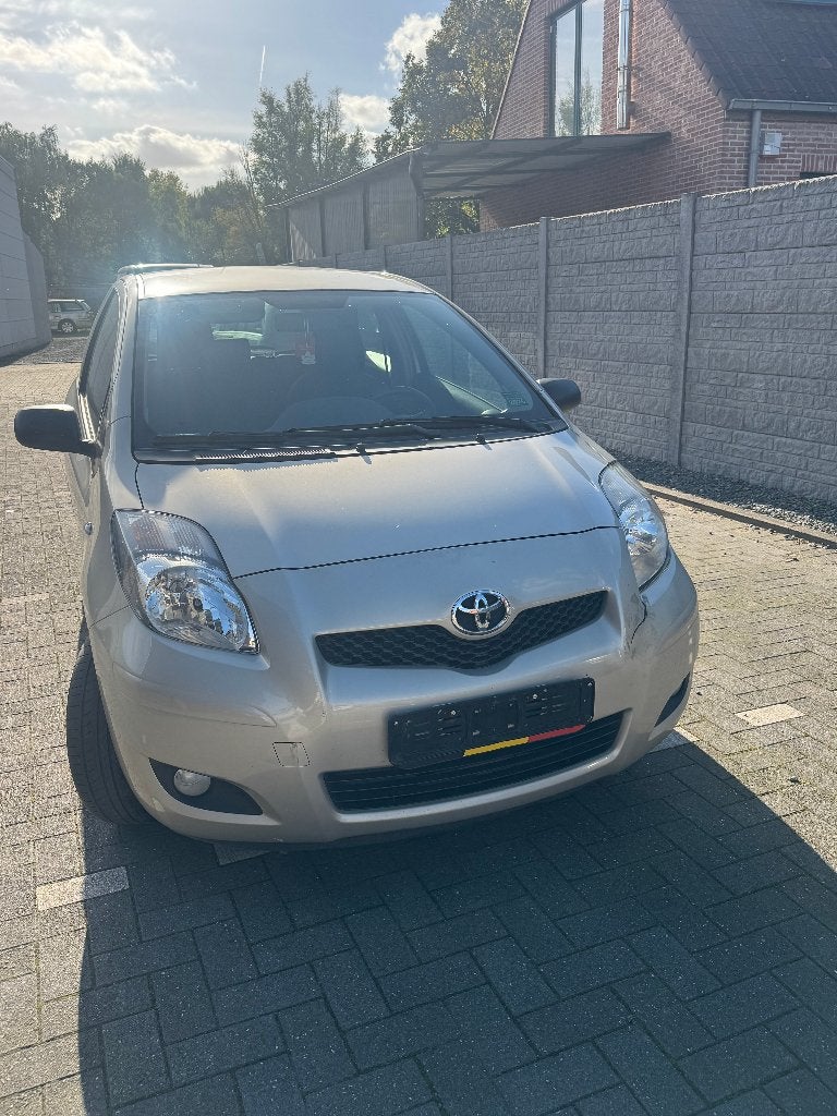Toyota Yaris 1.0benzine,bj.2010,km199tkm., Auto's, Voorwielaandrijving, Stof, Zwart, 4 cilinders