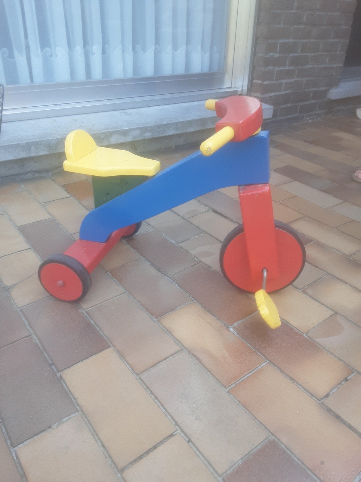 houten driewieler, Ophalen