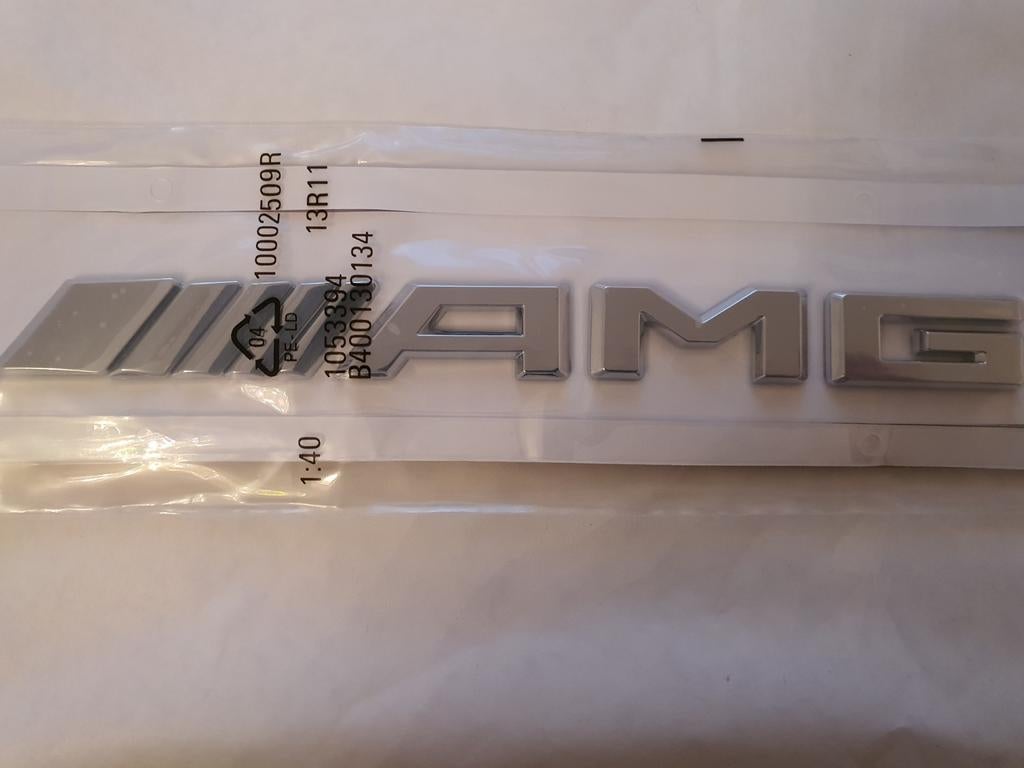 Mercedes Amg koffer logo in chroom of zwart, Auto-onderdelen, Ophalen of Verzenden, Nieuw, Mercedes-Benz