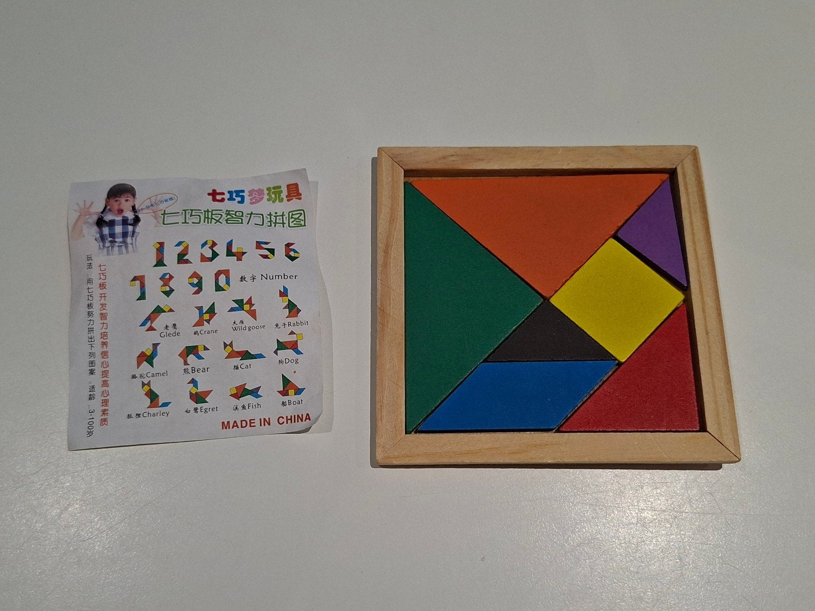 houten tangram in doosje, Kinderen en Baby's, Speelgoed | Educatief en Creatief, Ophalen of Verzenden, Gebruikt