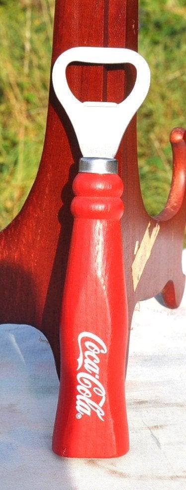 décapsuleur manche bois publicitaire coca cola, Enlèvement ou Envoi, Comme neuf, Ustensile