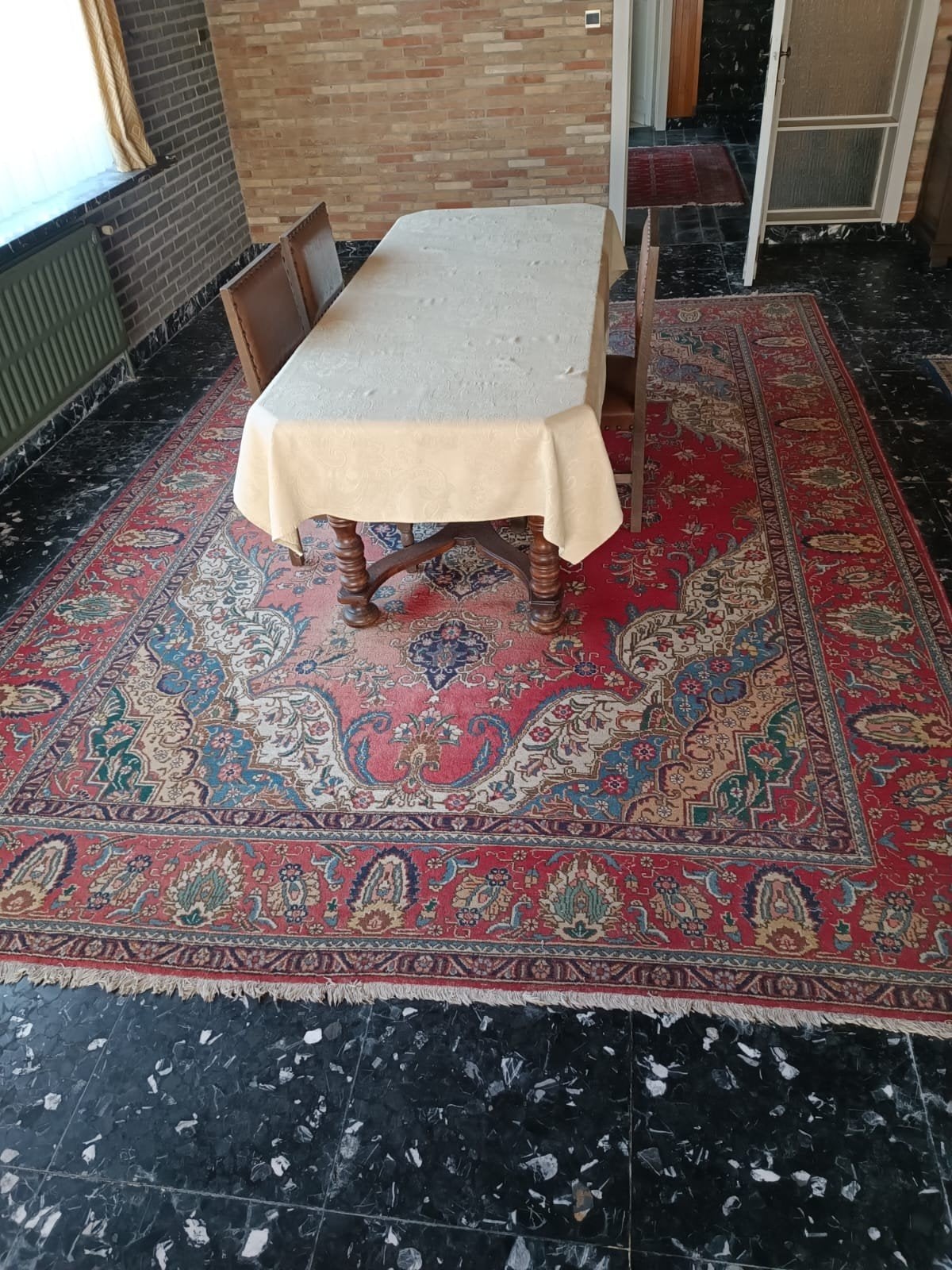 groot wollen handgeknoopt tapijt, Ophalen
