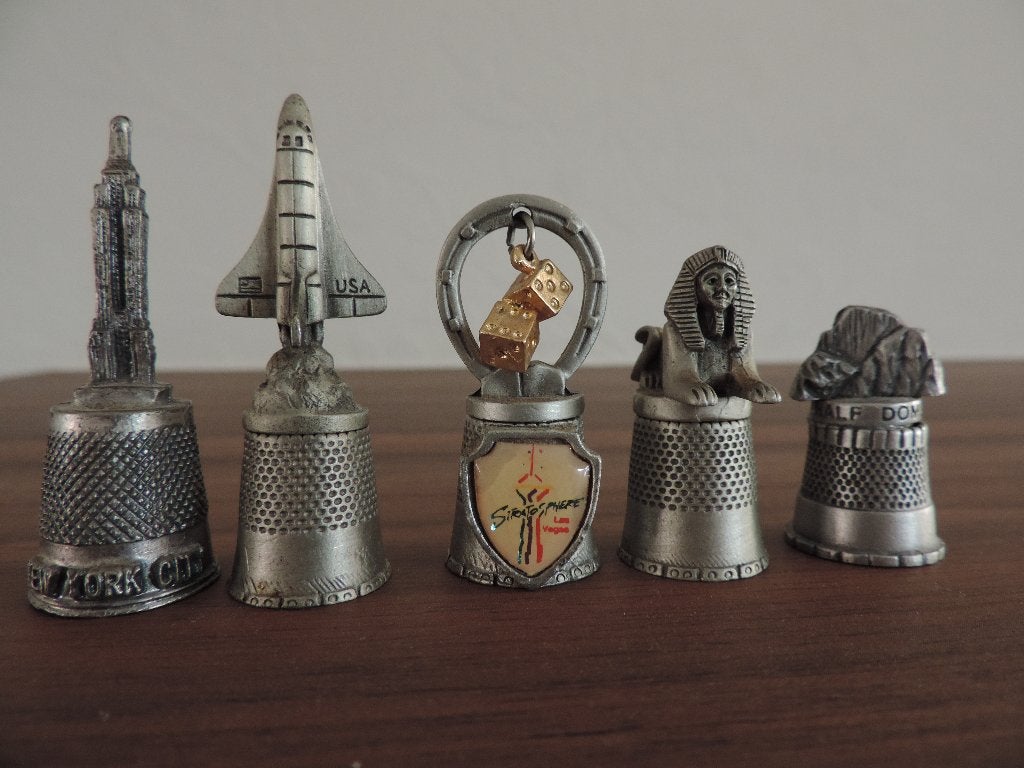 5 metalen vingerhoedjes : amerika, Ophalen, Zo goed als nieuw