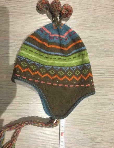 Gebreide Peruaanse chullo-muts met oorflappen, Kinderen en Baby's, Maat 50, Meisje, Ophalen of Verzenden, Zo goed als nieuw