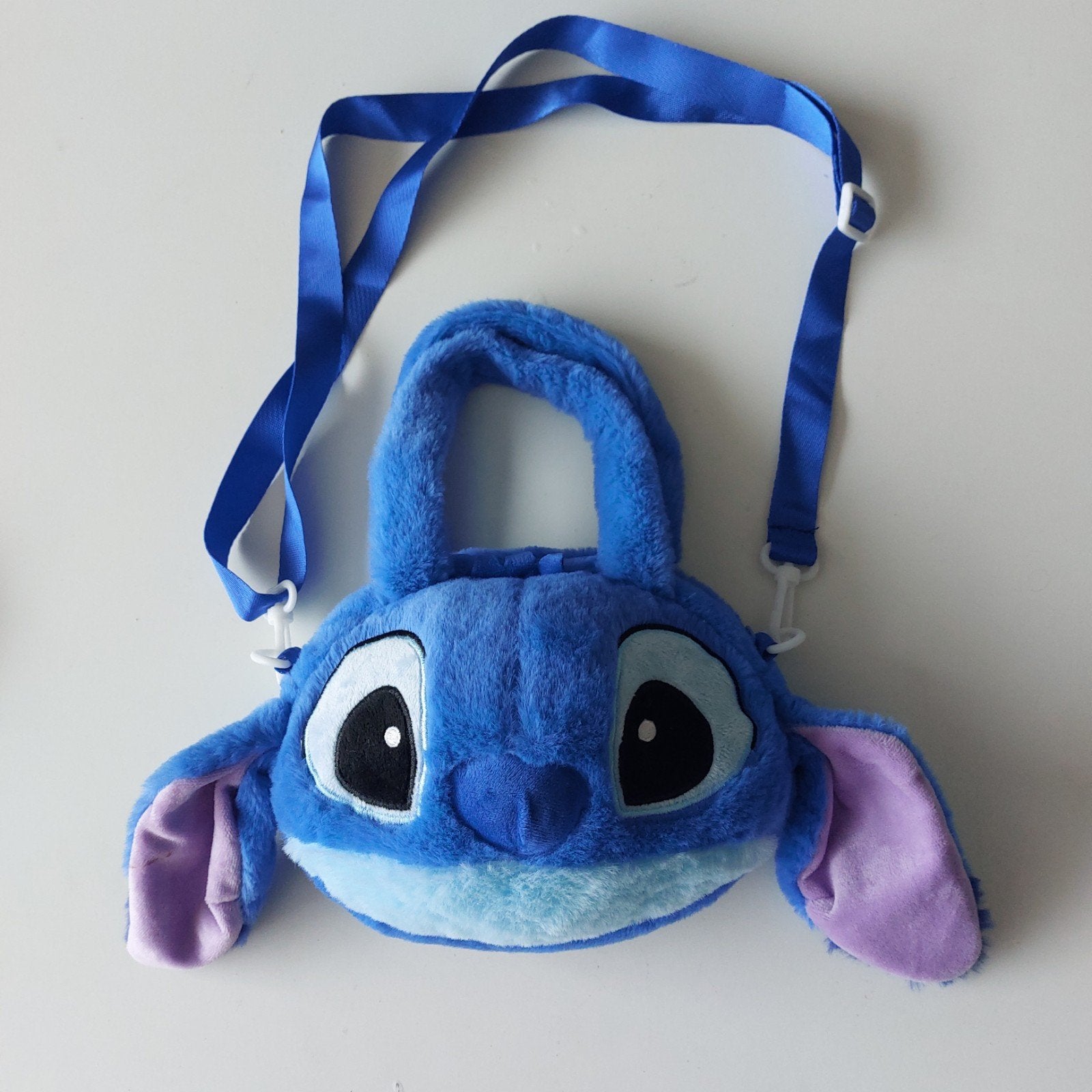 Handtasje Stitch. In heel goede staat, geen merk, Handtassen en Accessoires, Ophalen, Zo goed als nieuw, Blauw