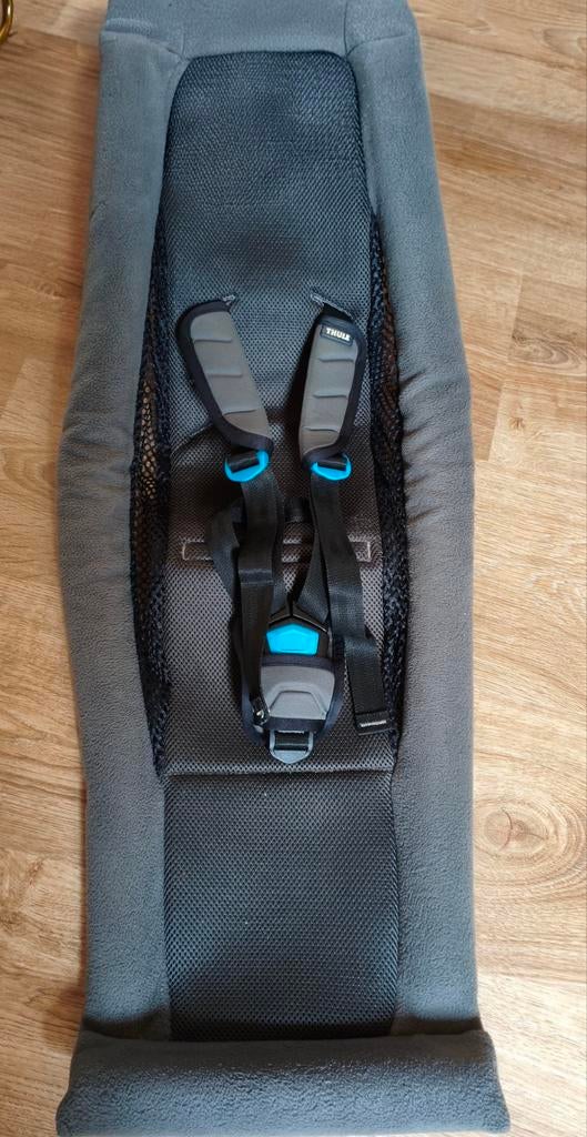 Thule infant sling. Babyzitje, Ophalen