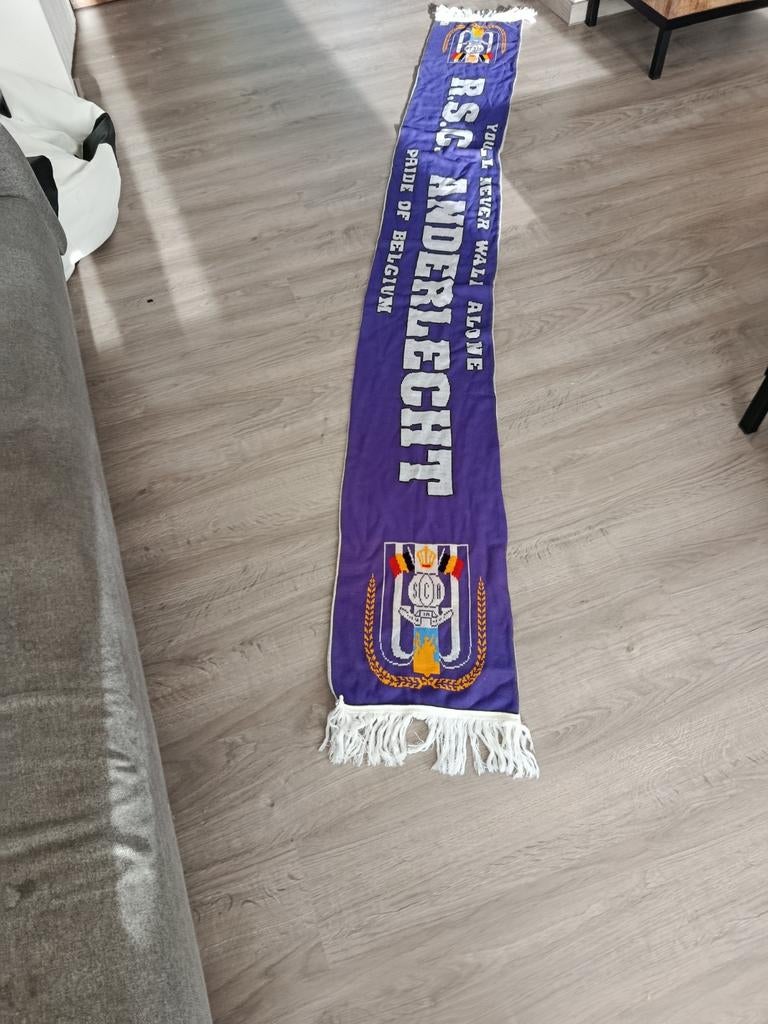 sjaal Anderlecht, Ophalen