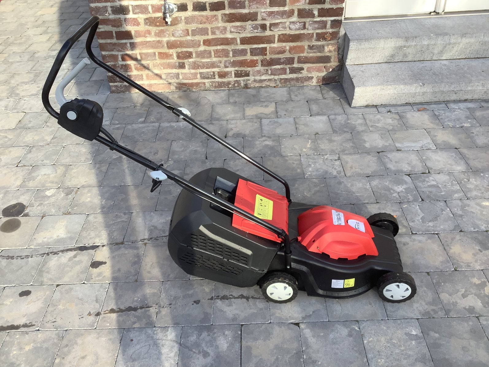 Kleine electrische grasmaaier, Ophalen