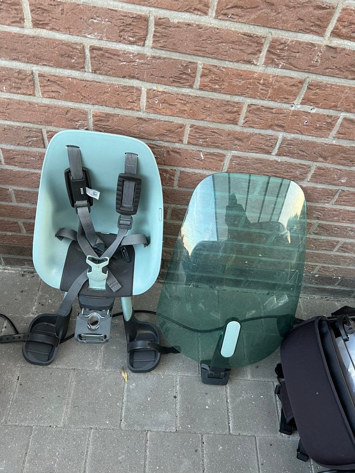 Fietsstoel vooraan, Ophalen, Zo goed als nieuw