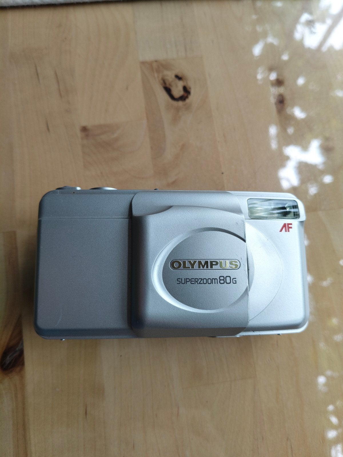 Olympus superzoom 80g, Ophalen, Olympus