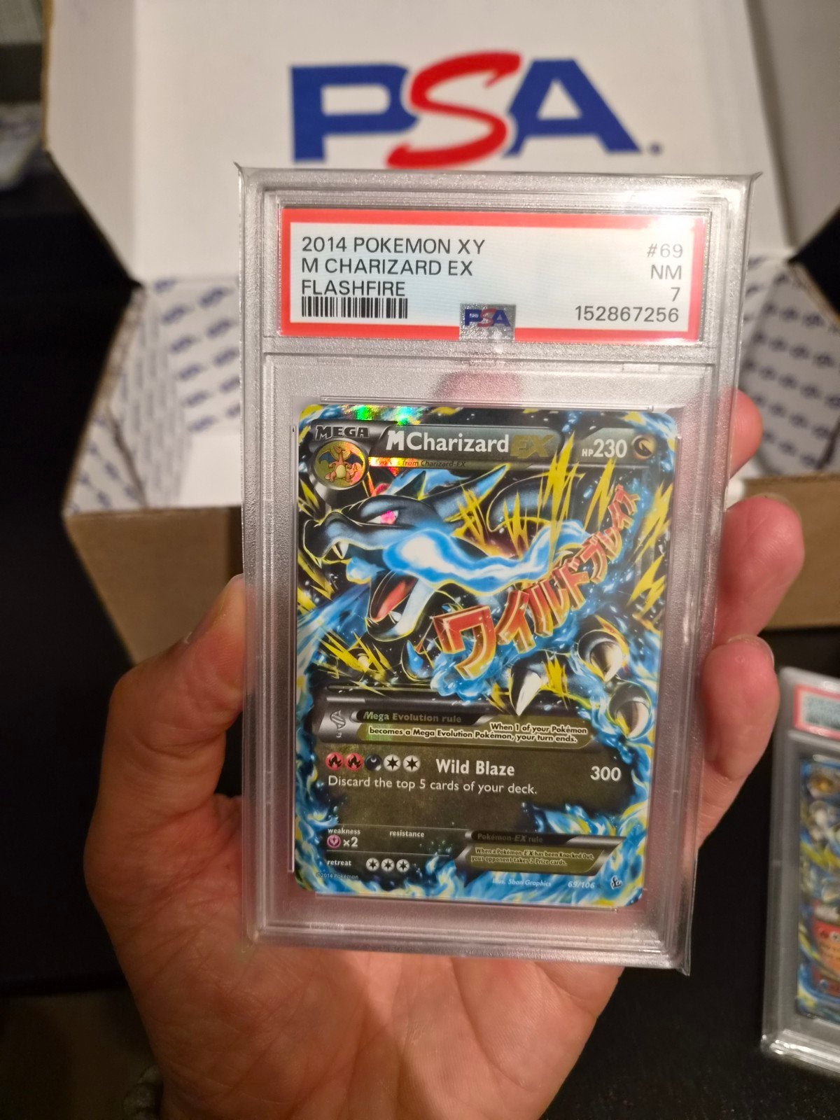 M Charizard EX PSA 7 Flashfire New Cert, Hobby en Vrije tijd, Verzamelkaartspellen | Pokémon, Ophalen of Verzenden, Zo goed als nieuw