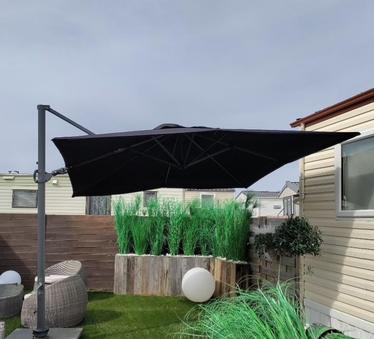 Parasol met stenen voetplaat, Ophalen